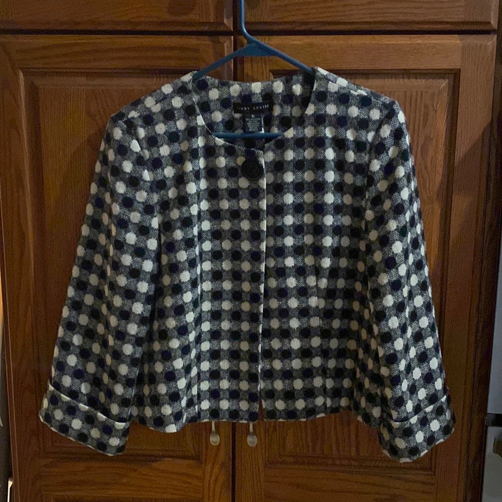 Waist length business casual jacket. Comfortable and warm.